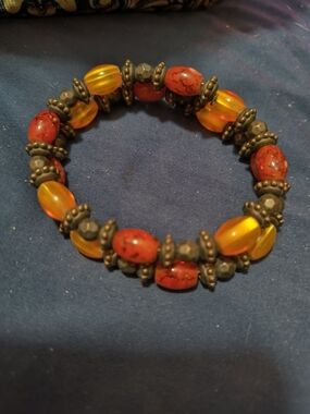 Red and Amber Beaded Stretch Bracelet with Antiqued Metal Accents